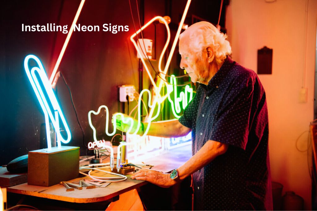 Neon sign installation in a small business storefront.